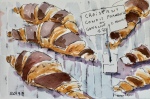 a pen and ink and watercolor of parisian croissants